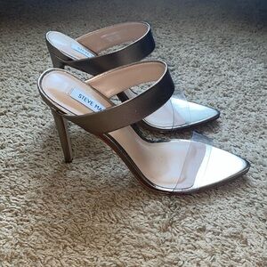 Heeled mules. Pointy toe, one transparent strap